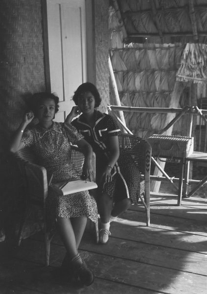 Lucy Shirazee and Bea Hutchinson at a beach hut, Hong Kong