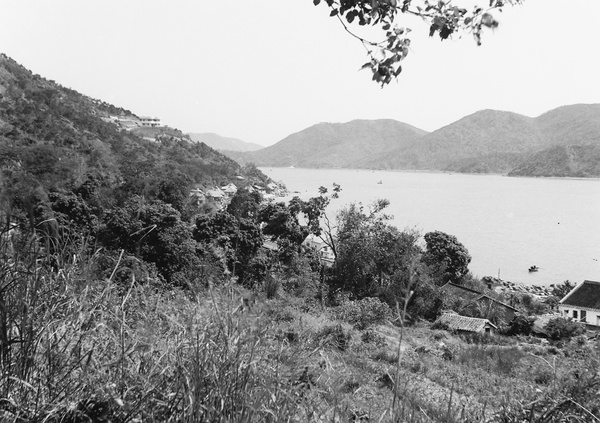 Beach huts and bay, Castle Peak Road, Hong Kong