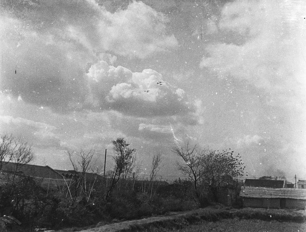 Six military aeroplanes in formation in the sky, near Shanghai, August 1937