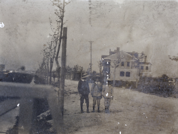 Three boys by the bridge to the Hutchinson family house, Tongshan Road, Hongkou, Shanghai