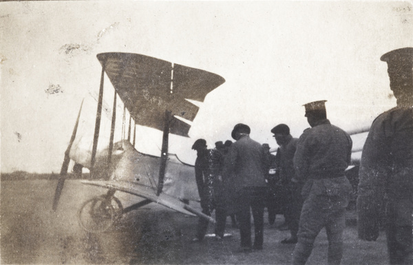 Crew and soldiers around Katherine Stinson's airplane, Jiangwan airfield, Shanghai