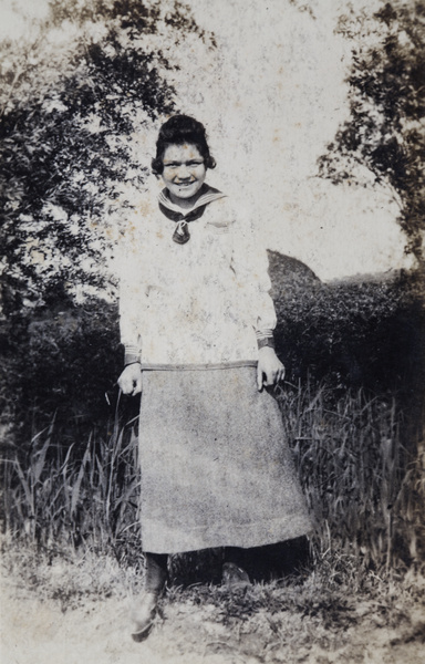 Hannah at the edge of a field