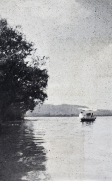 A canopied leisure boat