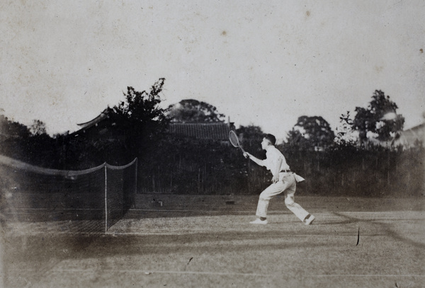 Young man playing tennis, Shanghai