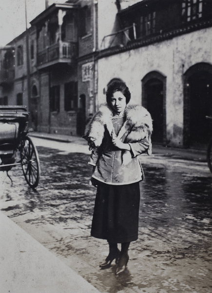 Young woman wearing Chinese-style jacket and fox fur stole, Shanghai