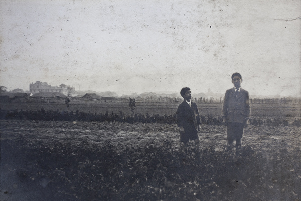 Fred and Dick Hutchinson standing in a field, Hongkou, Shanghai