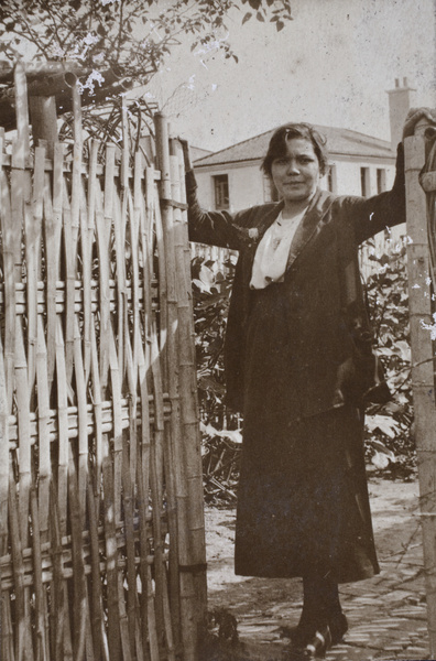 Hannah standing in the gate between the tennis lawn and the vegetable garden, 35 Tongshan Road, Hongkou, Shanghai