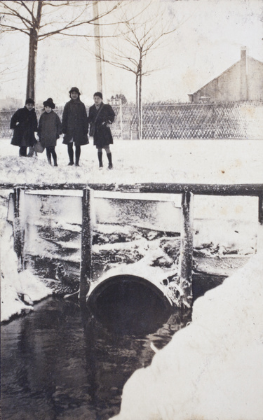 Fred, Maggie and Dick Hutchinson, standing with Nora on a snow covered Tongshan Road, Hongkou, Shanghai, February 1919