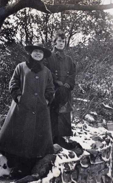 Hannah and Dolly wearing winter coats, Public Garden, Shanghai