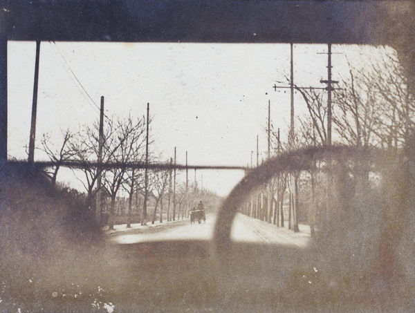 Avenue Joffre photographed through the front windscreen of a car, Shanghai