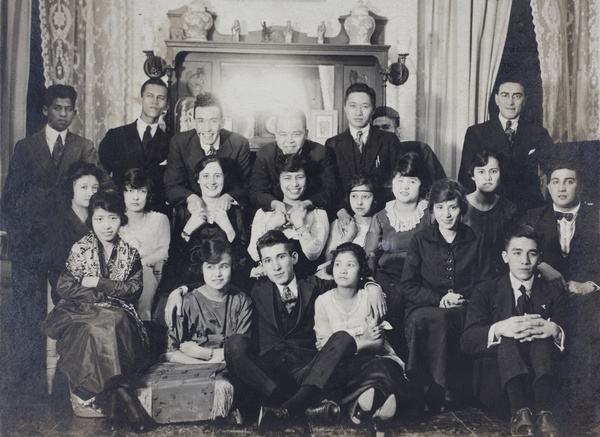 Georgie Roche, John Henderson, Bill and Charles Hutchinson at a party with friends, 35 Tongshan Road, Hongkou, Shanghai