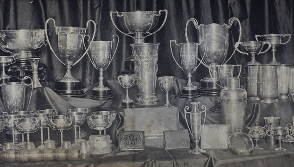 Display of horse racing trophies inscribed to W. G. Crokam