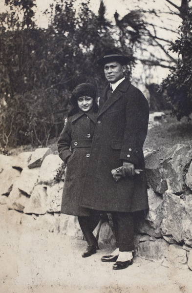 Unidentified young woman and man in a park, Shanghai