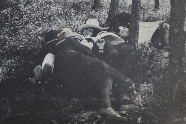 Maggie Hutchinson and Mabel Parker napping with other friends in a wooded area near Kunshan, April 1922