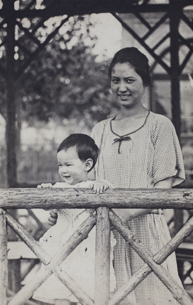 Bea and Sarah Hutchinson standing in the garden summerhouse, 35 Tongshan Road, Hongkou, Shanghai