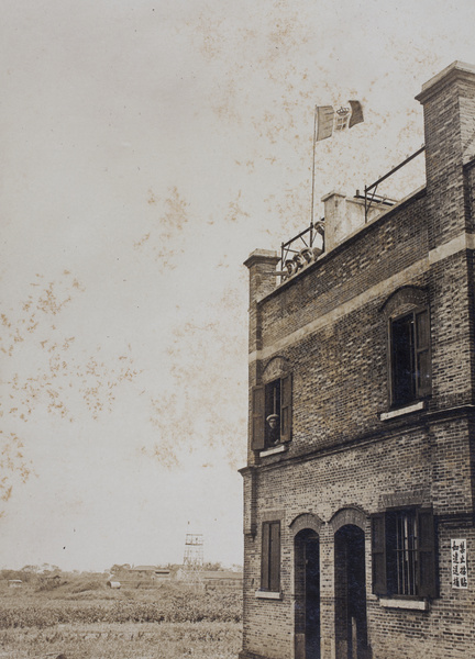 Italian Royal Navy sailors from RM Libia on lookout in a building near Shanghai, 1924