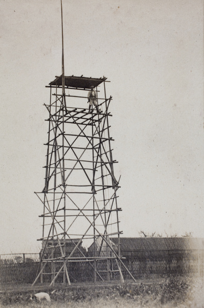 Italian Royal Navy sailor from RM Libia on lookout in watchtower made of bamboo scaffolding, Shanghai, 1924