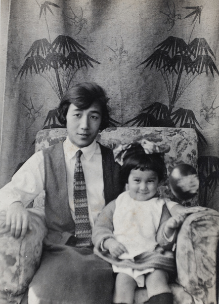 Maggie and Bea Hutchinson sitting in an armchair, 35 Tongshan Road, Hongkou, Shanghai