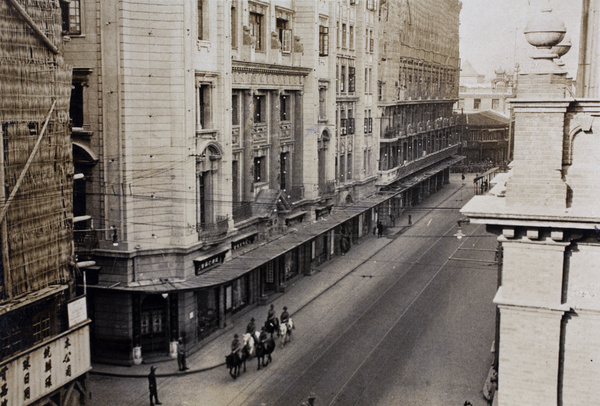 Shanghai Volunteer Corps American Mounted Troop patrolling Nanjing Road outside Sincere's Department Store, Shanghai, 1925