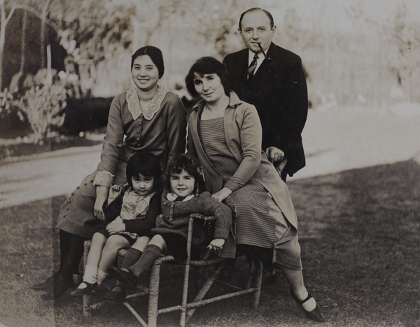 Sarah and Bea Hutchinson in the garden with the Koskey family, 35 Tongshan Road, Hongkou, Shanghai