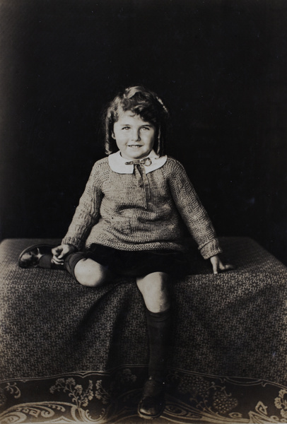 Phyllis Koskey wearing a handknitted jumper, Shanghai