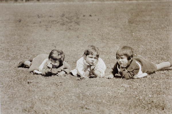 Gladys Hutchinson, Thelma Thiis, and Bea Hutchinson, posing on the garden lawn, 35 Tongshan Road, Hongkou, Shanghai