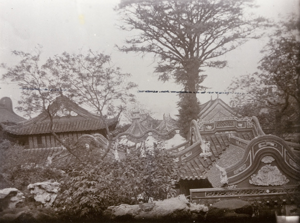 View over gardens and ornamented roof tops, Shanghai