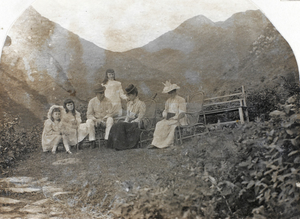 The Hughes family resting after a walk