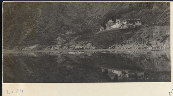 Hei long tan Monastery on a cliff alongside a river