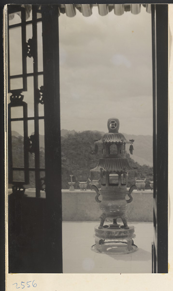 Incense burner and ritual objects from an altar on a terrace outside the Sheng mi zhi tang Monastery