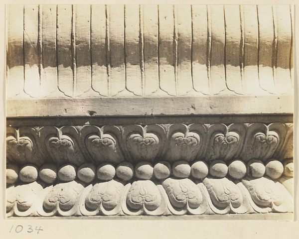 Detail of Liu li pai fang showing marble relief work with lotus motif at Pu tuo zong cheng miao