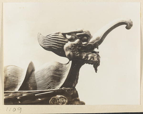 Detail showing double-eaved roof of Miao gao zhuang yan dian with a sea elephant