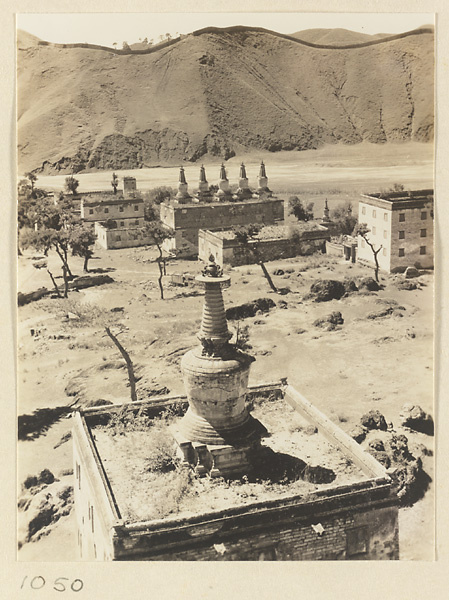 General view of the southwest corner of the temple complex at Pu tuo zong cheng miao showing Dan ta bai tai, Bai tai, and Wu ta bai tai with Re River in the background