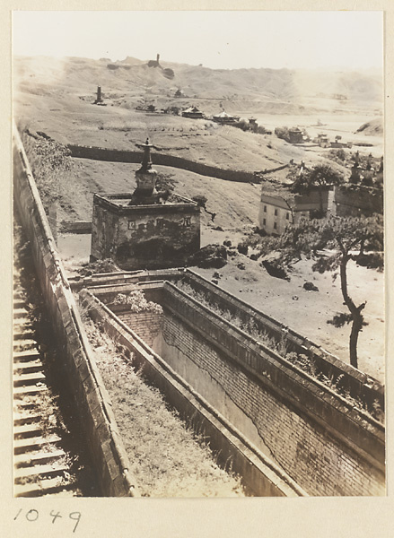 Stairs and Dan ta bai tai with stupa-type pagoda on the roof at Pu tuo zong cheng miao and general view of Xu mi fu shou zhi miao and Qingchui Peak in the background