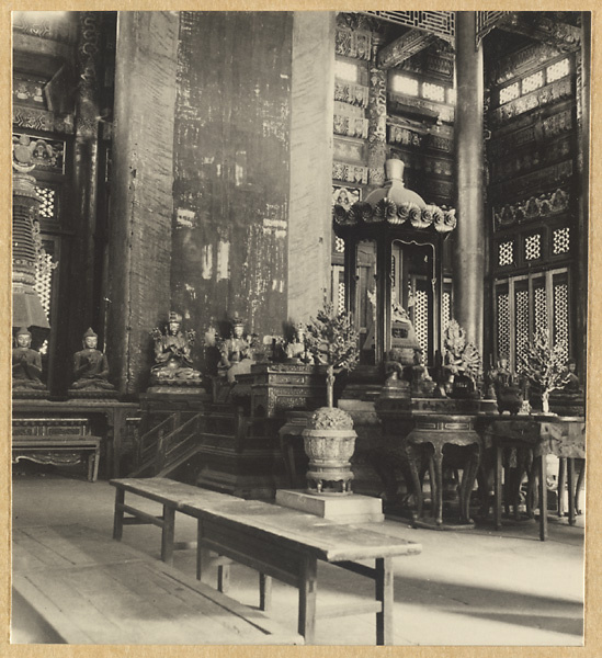 Interior view of Wan fa gui yi dian showing detail of stuypa-style pagoda (left) and temple statues