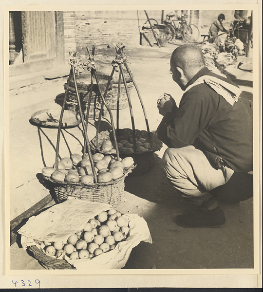 Street vendor at his produce stand in Baoding