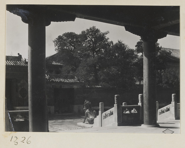 Courtyard with a bronze qi lin seen from porch in the Forbidden City