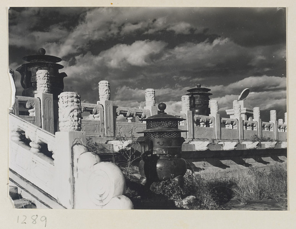 Detail of south balustrade of Tai he dian with bronze incense burners and marble sundial