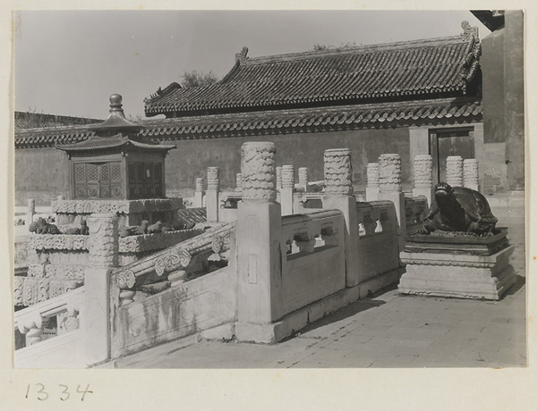 Terrace with tortoise-shaped incense burner, marble balustrade, and small double-eaved pavilion in the Forbidden City