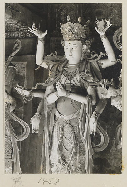 Statue of a multi-armed Bodhisattva at Da Fo si