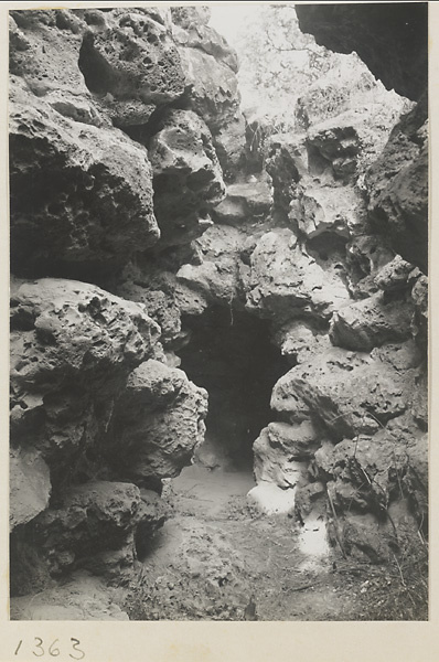 Artificial rock hill with cave entrance in the Forbidden City