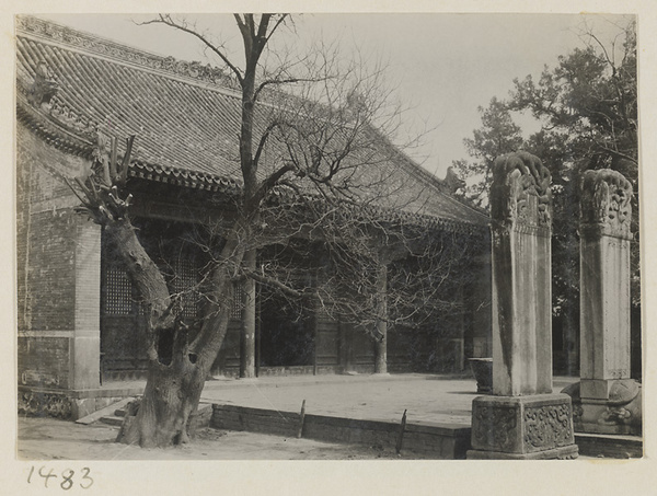 Facade of a temple building and courtyard with stone stelae at Qian men temple or Guan di miao