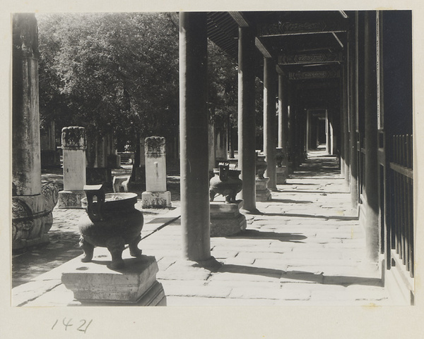 Columnaded porch with incense burners and courtyard with stelae and tortoise stela at Dong yue miao