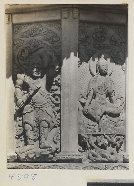 Detail of Hua zang hai ta at Yuquan Hill showing marble relief carving with warrior and Buddha figures