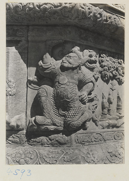 Detail of marble relief carving showing a male figure at Yuquan Hill