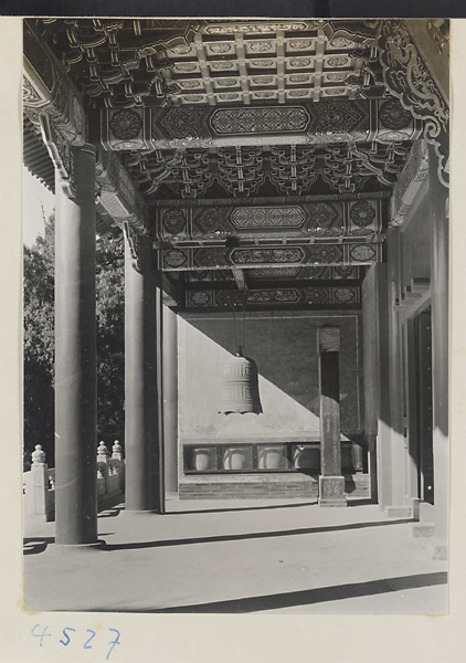 Interior of Da cheng men showing side wall, bell, and stone stela at Kong miao