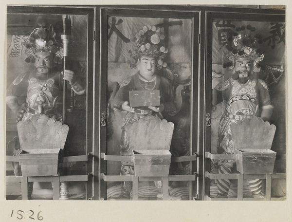 Interior of Lao ye miao showing three shrine figures in glass cases