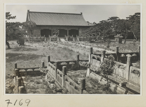 North facade of Ling en men and glazed-tile sacrificial stoves in second courtyard at Chang ling seen from terrace of Ling en dian