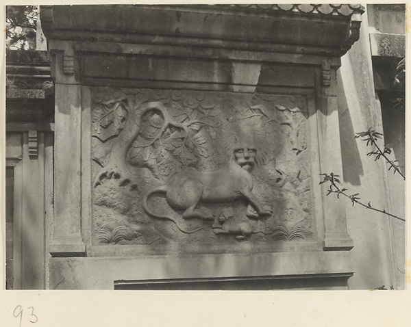 Detail of gate at Gang Tie miao showing relief carving of lions