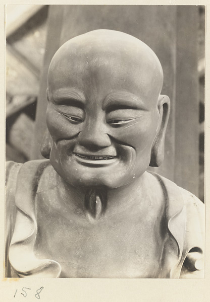 Interior of Luohan tang at Bi yun si showing detail of a statue of a Luohan